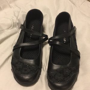 Black Skechers flat shoe